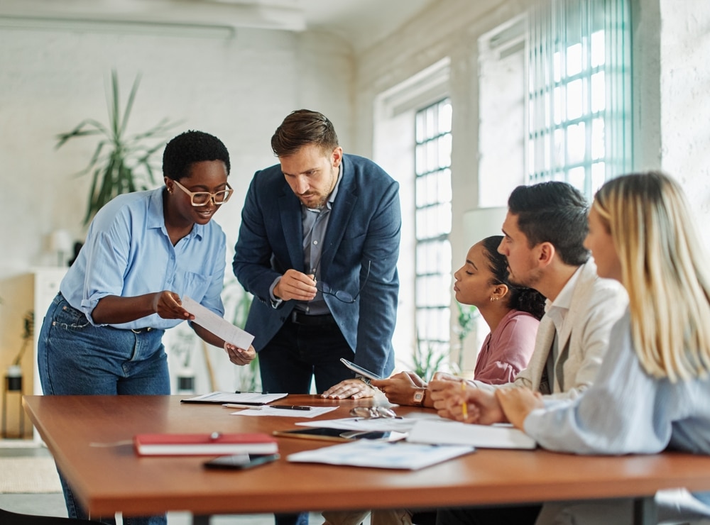 Group,Of,Young,Business,People,Having,A,Meeting,Or,Presentation